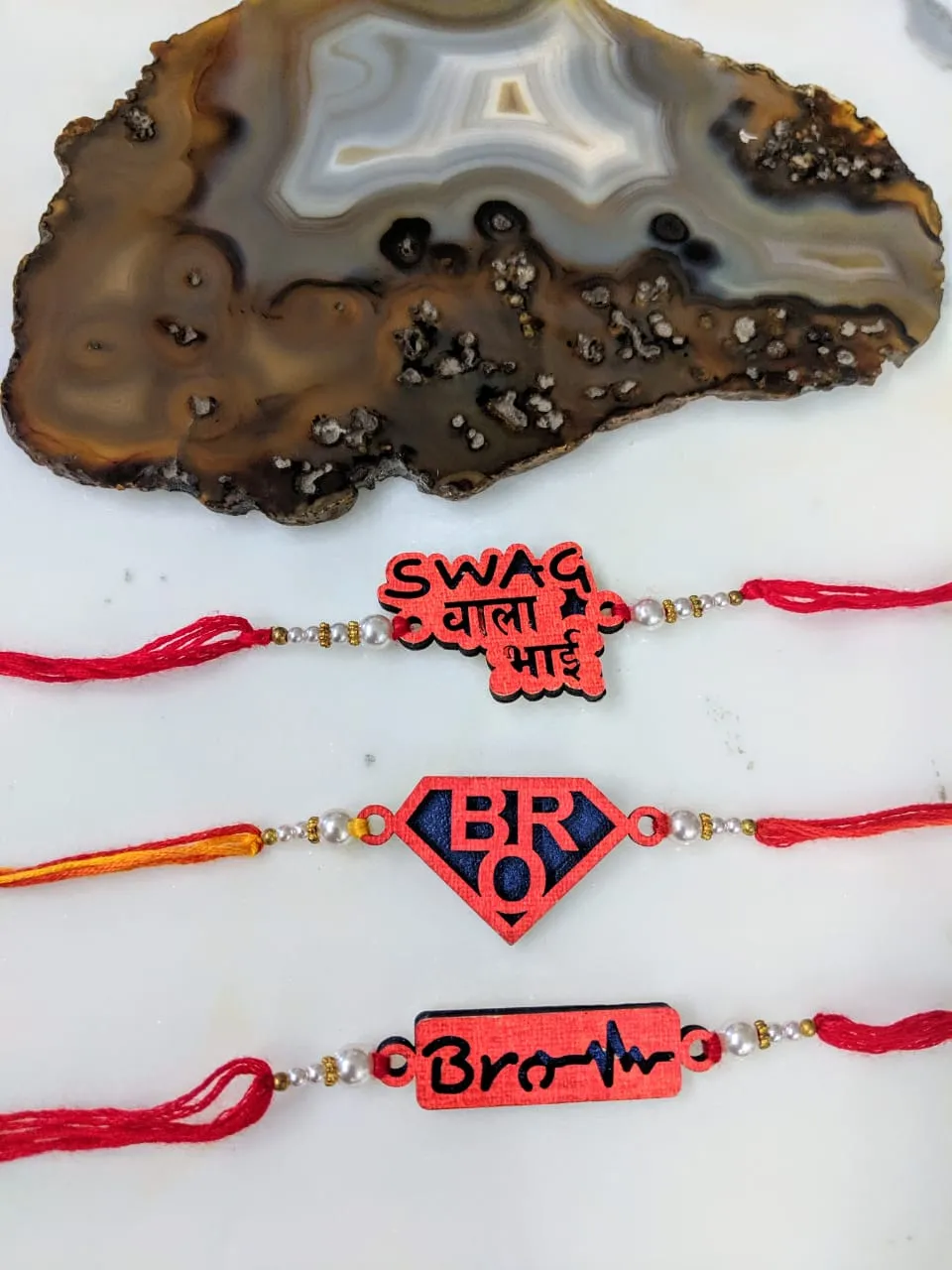 3 Set of Rakhi with Swag Wala Bhai/ Bro/ Brother Slogan White Pearls Red Thread Rakhi
