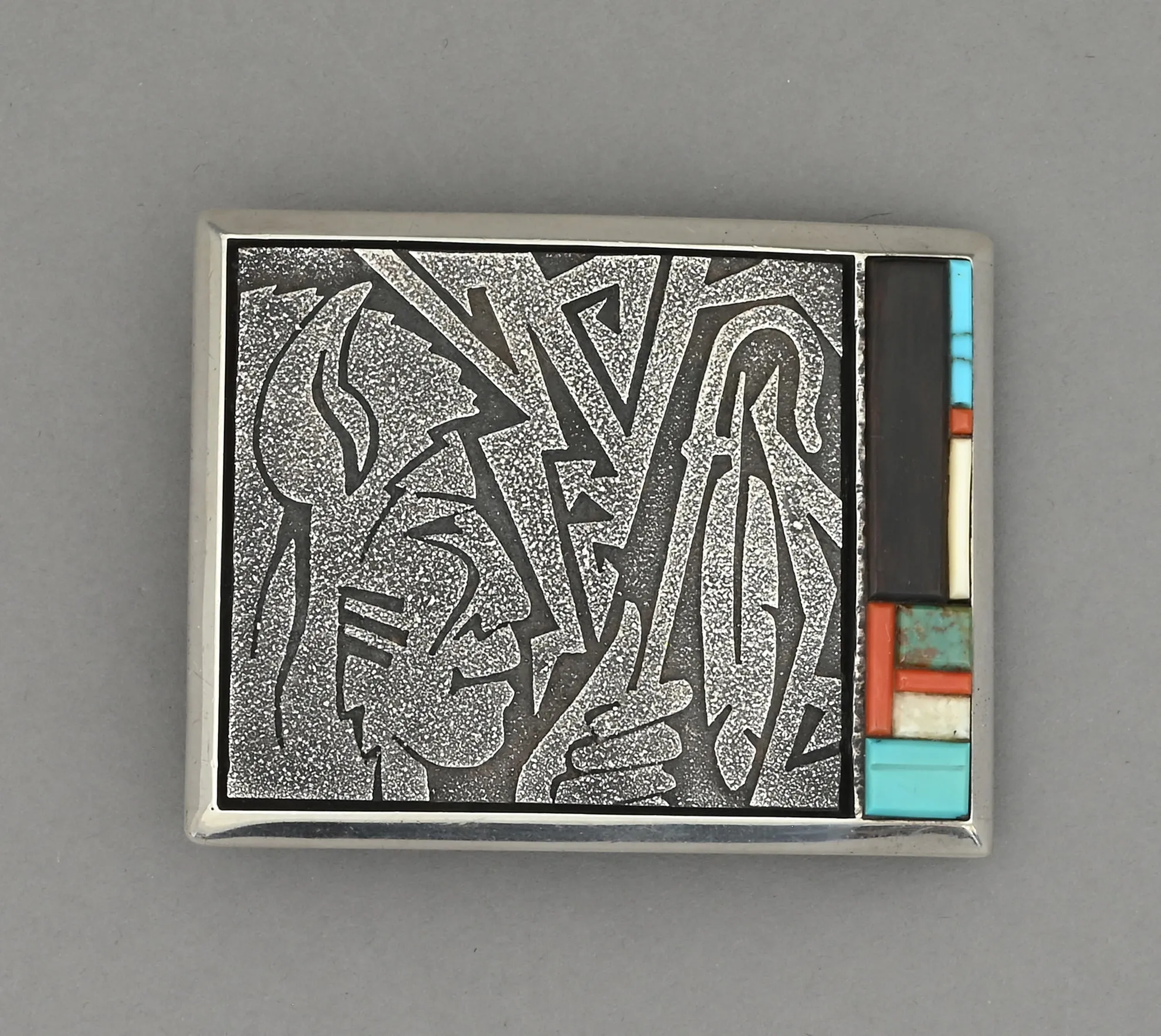 Belt Buckle with Inlay (Tufa Cast) by Richard Tsosie