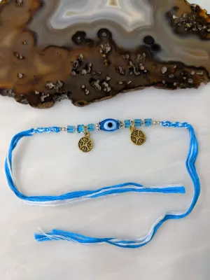 Blue Evil Eye Beads Rakhi for Men Gold Plated Round Pendant Rakhi