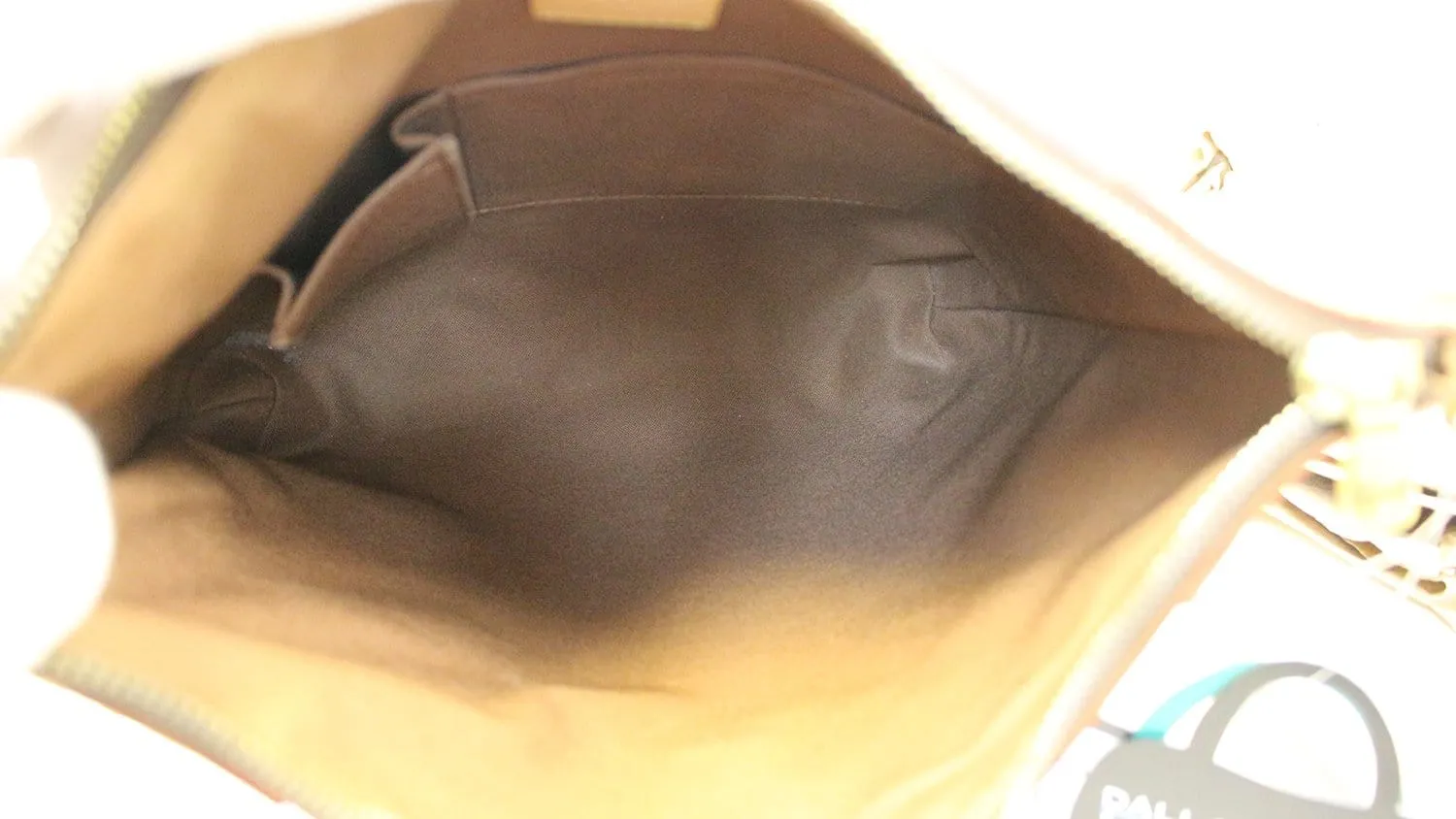 LOUIS VUITTON Monogram Canvas Odeon MM Crossbody Bag