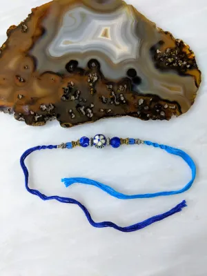 Simple Beautiful Designer Flower Rakhi With Multicolor Thread For Raksha Bandhan