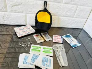Small compact emergency first aid kit with clip belt bag