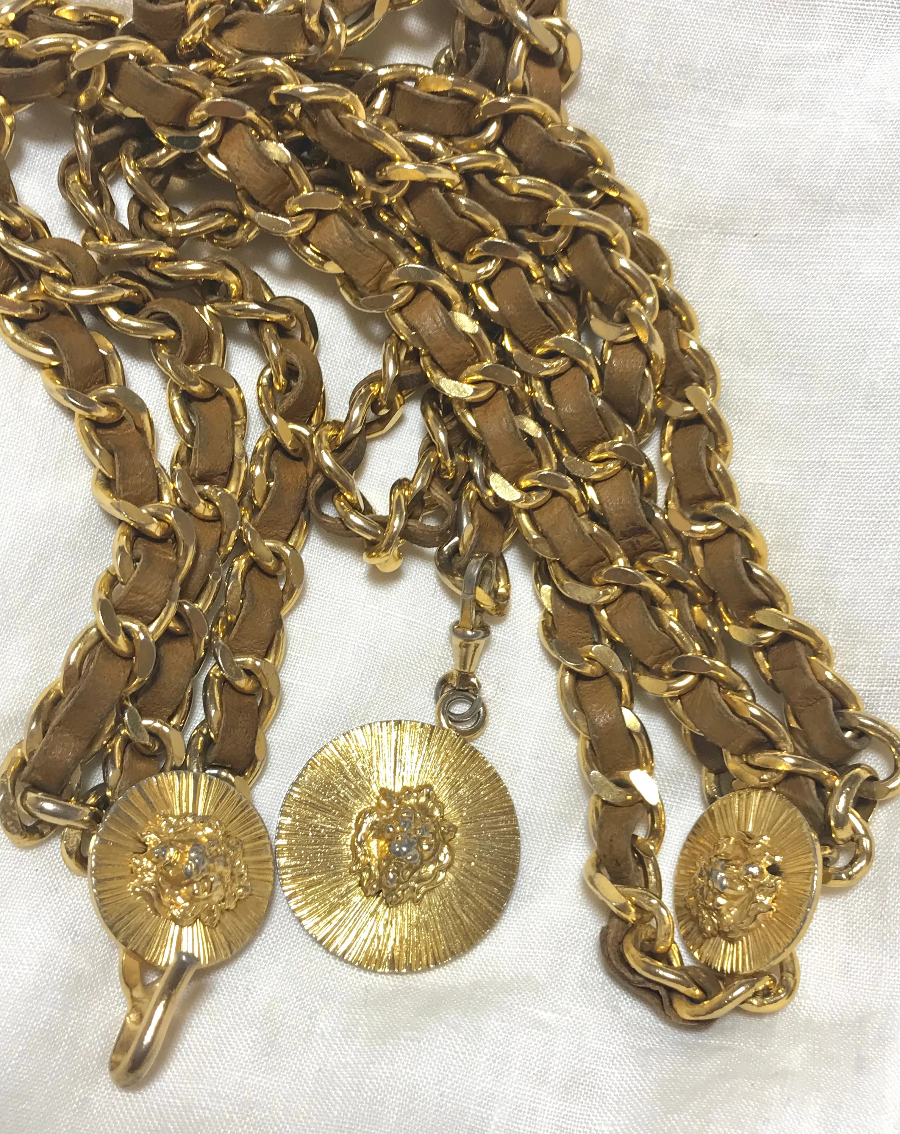Vintage CHANEL triple layer golden chain and brown leather belt with CC and lion charms. Beautiful classic belt back in old era. R0410119