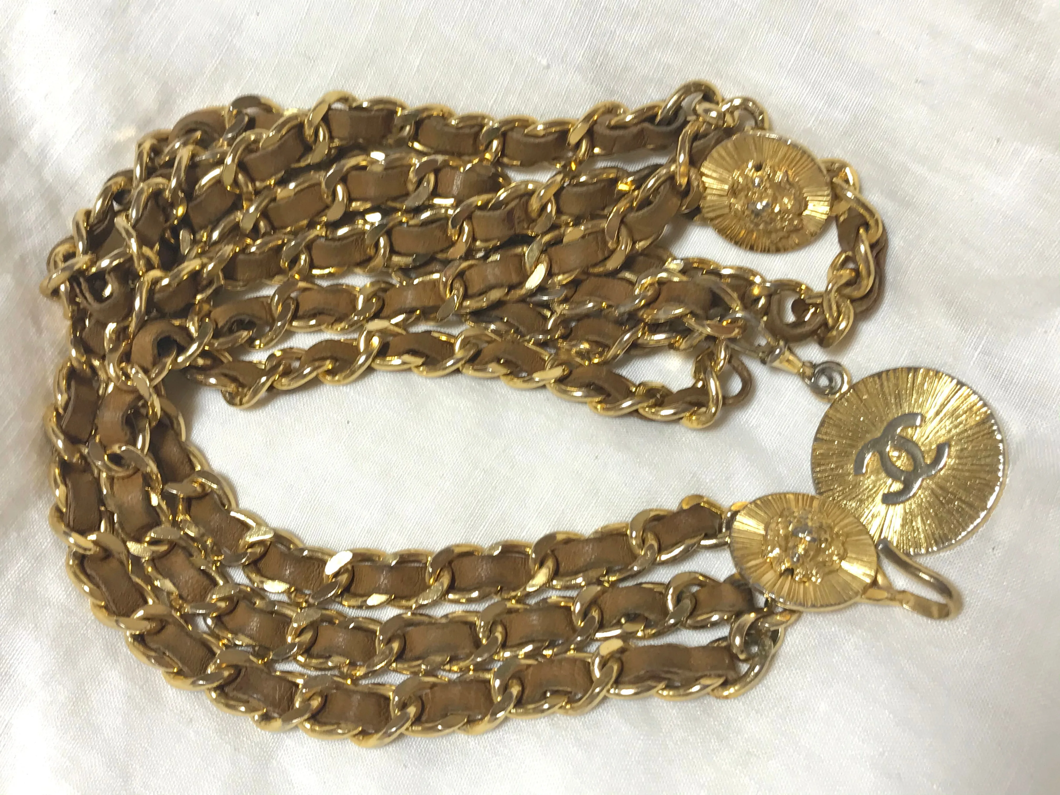 Vintage CHANEL triple layer golden chain and brown leather belt with CC and lion charms. Beautiful classic belt back in old era. R0410119