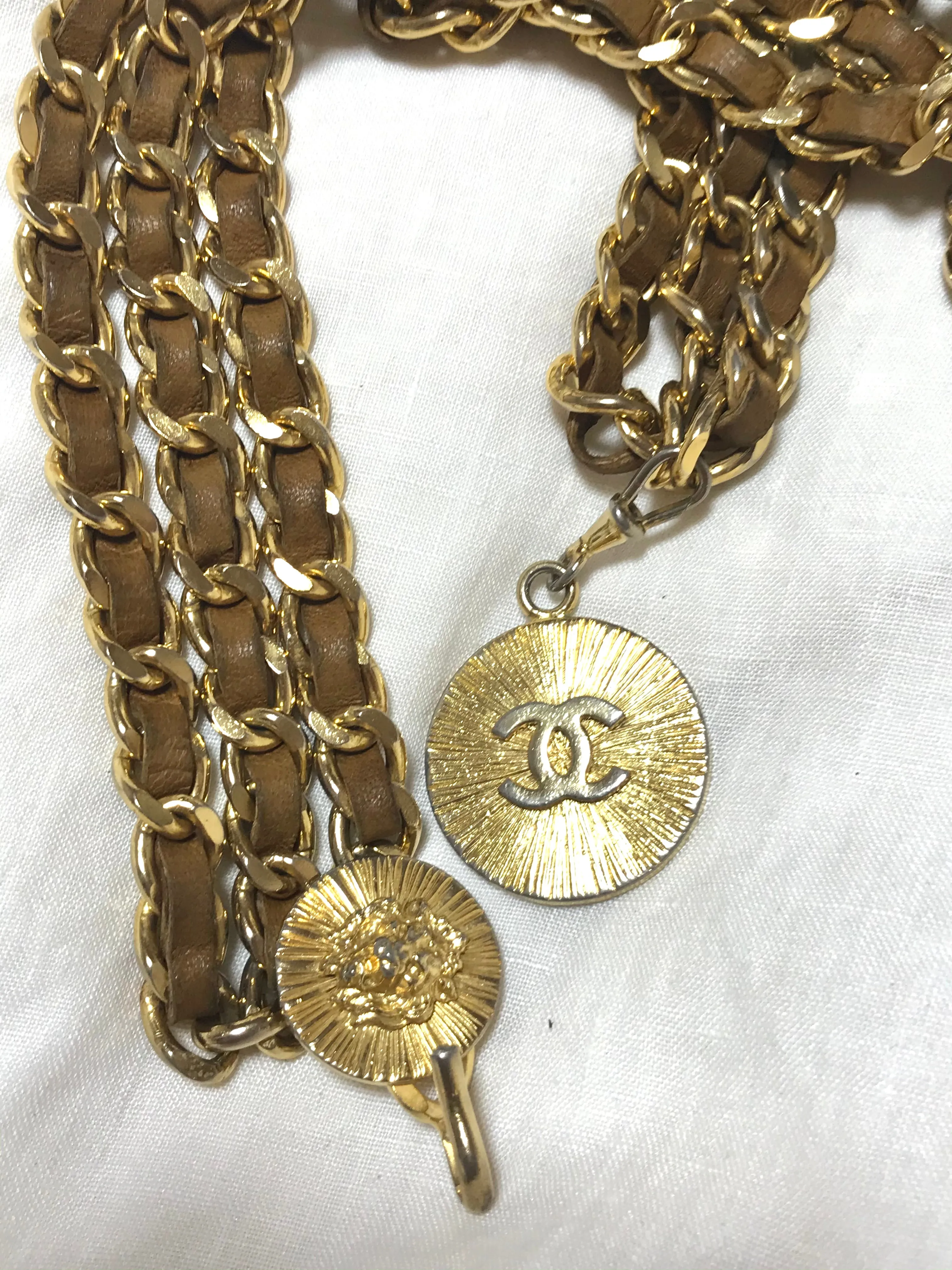 Vintage CHANEL triple layer golden chain and brown leather belt with CC and lion charms. Beautiful classic belt back in old era. R0410119
