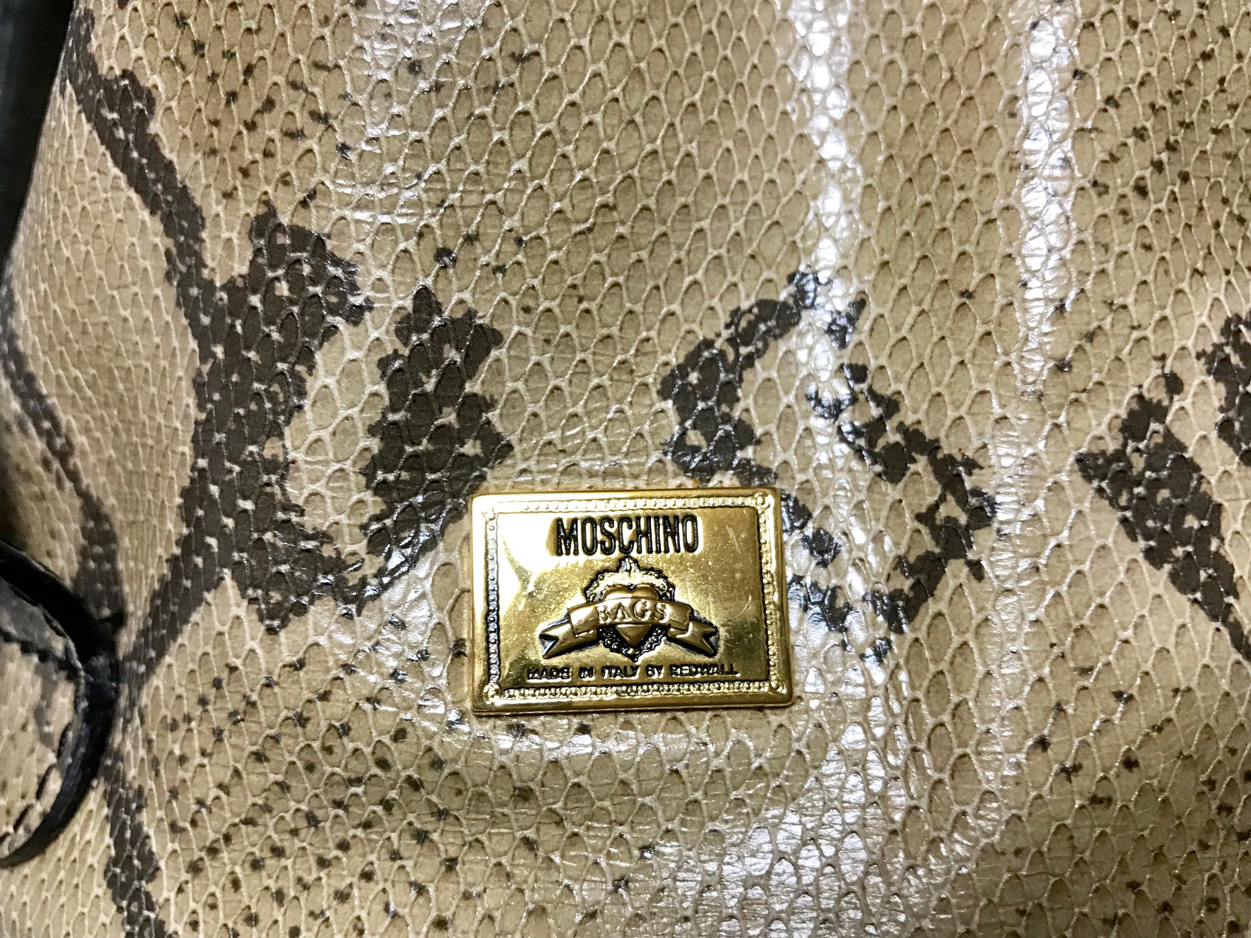 Vintage MOSCHINO by redwall snakeskin print leather mini backpack with golden M logo charm. Perfect chic and mod daily bag. 070131re1